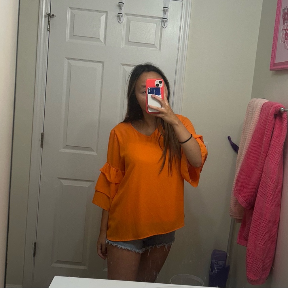 Vibrant Orange Blouse with Ruffle Sleeves